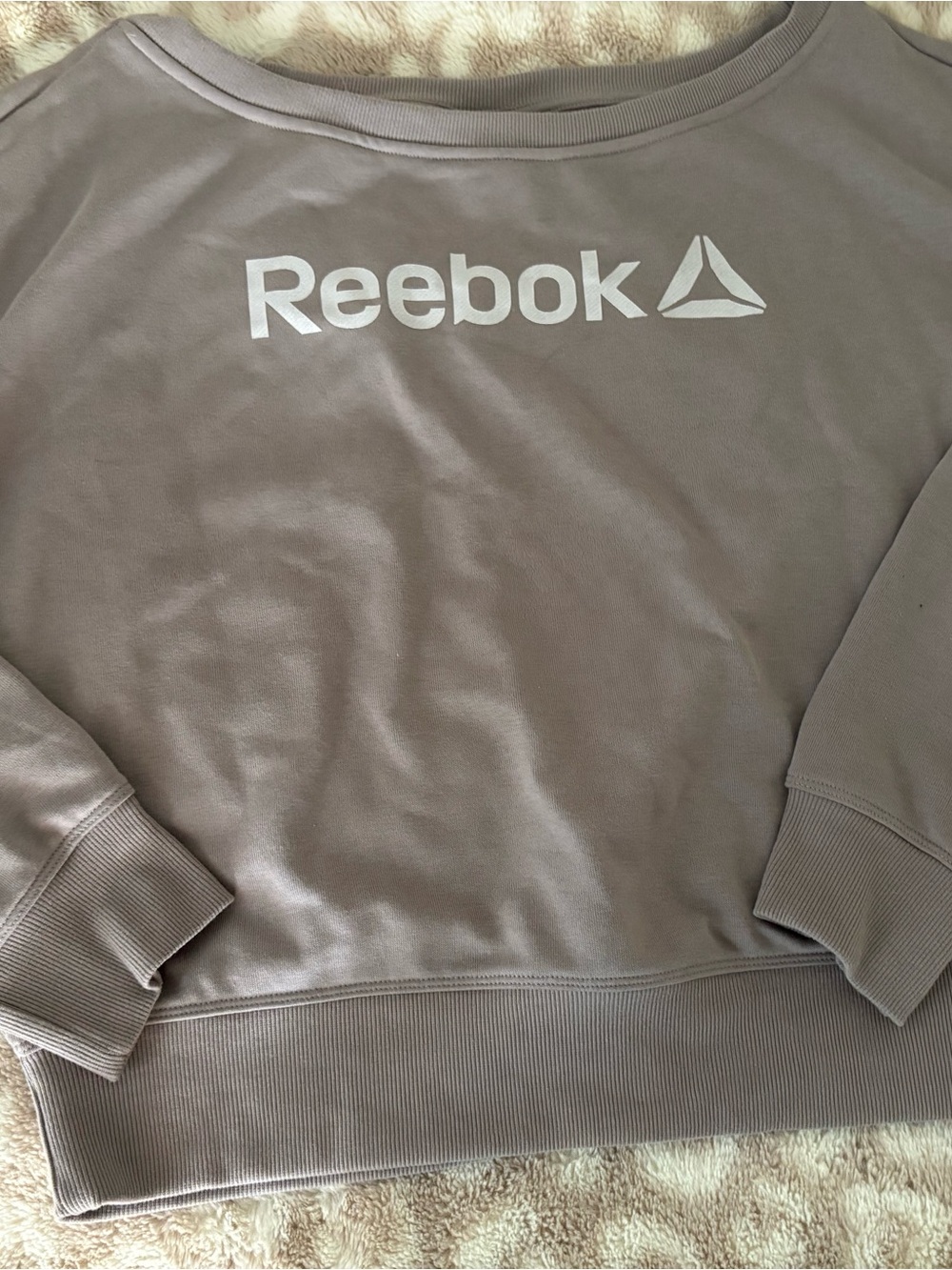 Reebok off shoulder